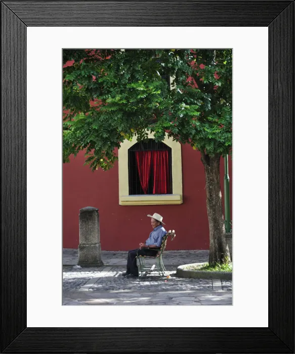 Framed Print : Elderly man sat in Plaza at Iglesia de la Merced, Comayagua, Central America, Honduras