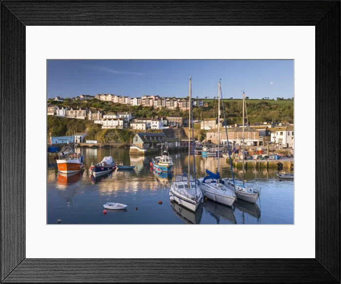 Framed Print : Fishing boats and yachts moored in Mevagissey harbour, Cornwall, England. Spring