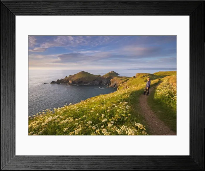 Framed Print : Man appreciating the beautiful coastal view at The Rumps, North Cornwall, England Framed Print : Man appreciating the beautiful coastal view at The Rumps, North Cornwall, England