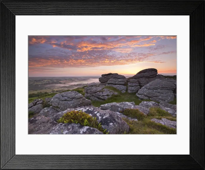 Framed Print : Spectacular sunrise above the granite tor on Meldon Hill, Dartmoor National Park, Devon