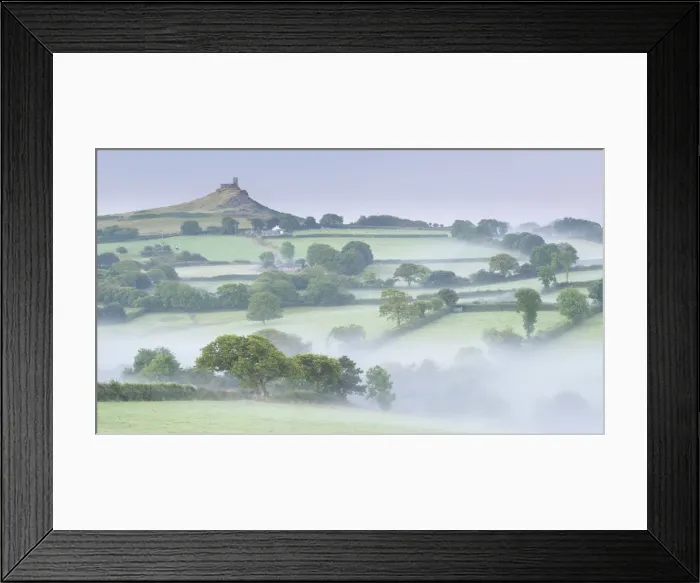 Framed Print : Rolling mist covered countryside surrounding Brentor Church, Dartmoor, Devon, England Framed Print : Rolling mist covered countryside surrounding Brentor Church, Dartmoor, Devon, England