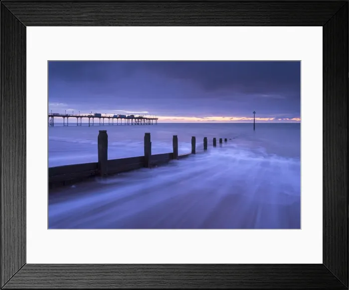Framed Print : Waves rush over the beach at Teignmouth at dawn, Devon, England. Winter (January) 2016 Framed Print : Waves rush over the beach at Teignmouth at dawn, Devon, England. Winter (January) 2016