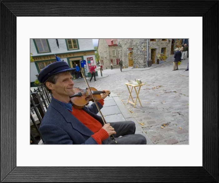 Framed Print : Quebec City, Canada. A street busker palying fiddle for tourist crowds in Old Quebec City Framed Print : Quebec City, Canada. A street busker palying fiddle for tourist crowds in Old Quebec City