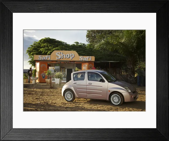 Framed Print : Bujumbura, Burundi. A modern Chinese car on the beach at the weekend Framed Print : Bujumbura, Burundi. A modern Chinese car on the beach at the weekend