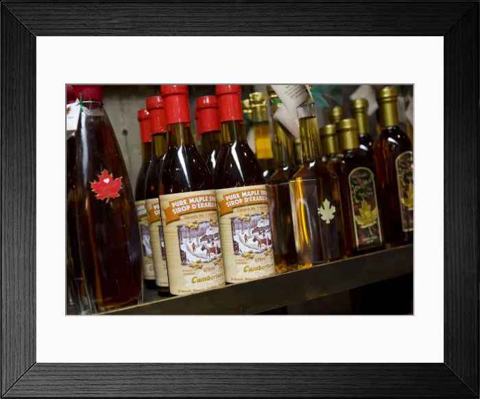 Framed Print : Quebec City, Canada. Canadian maple syrup on the shelf in old Quebec City Canada
