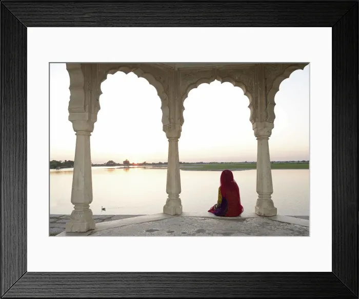 Framed Print : Indian woman watching sunset, Village of Pachewar, Rajasthan, India, Asia Framed Print : Indian woman watching sunset, Village of Pachewar, Rajasthan, India, Asia