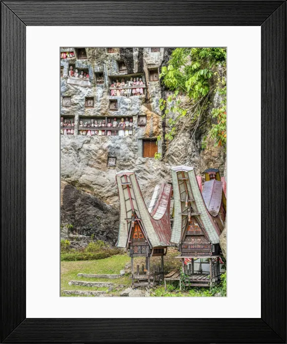 Framed Print : Wooden statues of Tau Tau tombs guardians who represent the deceased persons Framed Print : Wooden statues of Tau Tau tombs guardians who represent the deceased persons