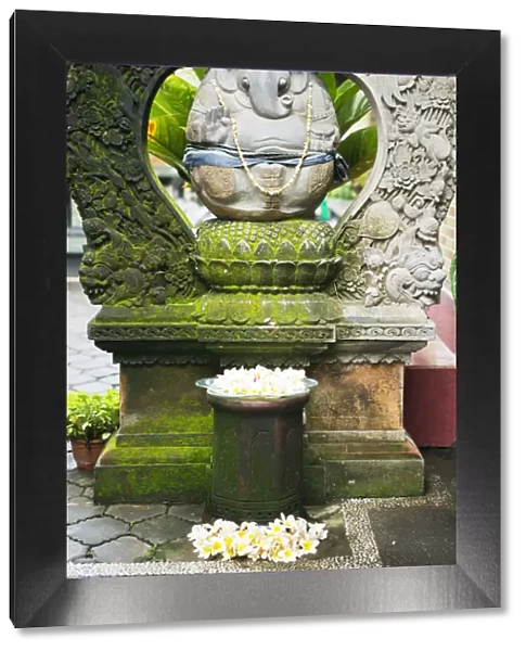 Asia, Indonesia, Bali, Ubud, ganesh statue at the entrance to a traditional home
