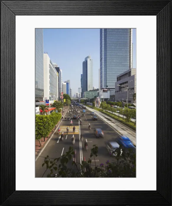 Framed Print : Traffic moving along Jalan Thamsin, Jakarta, Java, Indonesia Framed Print : Traffic moving along Jalan Thamsin, Jakarta, Java, Indonesia