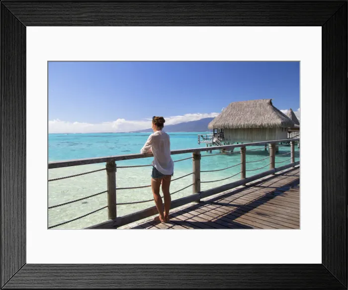Framed Print : Woman on jetty of overwater bungalows of Sofitel Hotel, Moorea, Society Islands, French Framed Print : Woman on jetty of overwater bungalows of Sofitel Hotel, Moorea, Society Islands, French