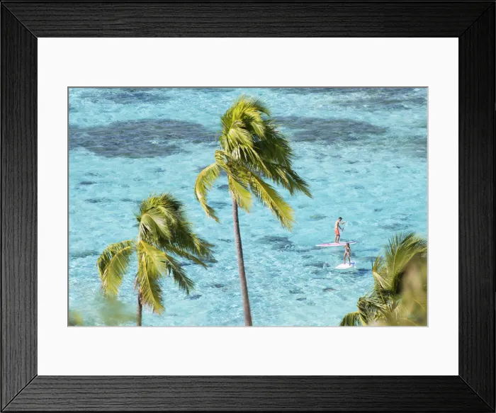 Framed Print : Couple paddleboarding in lagoon, Moorea, Society Islands, French Polynesia Framed Print : Couple paddleboarding in lagoon, Moorea, Society Islands, French Polynesia