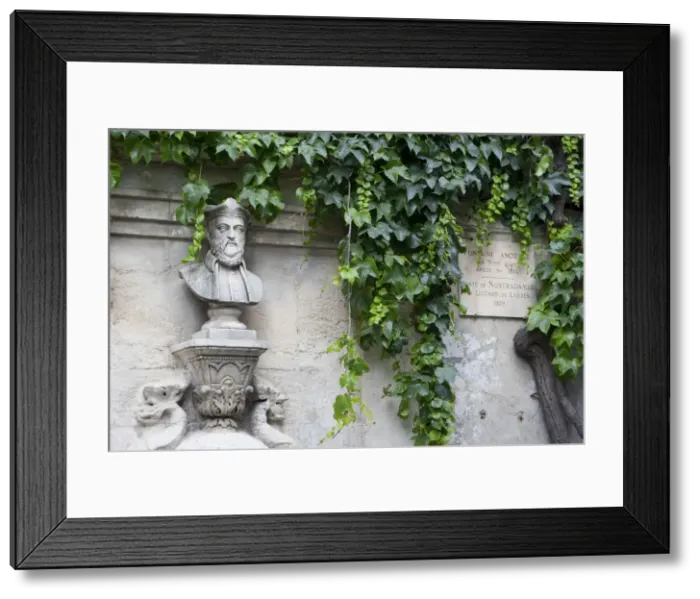 Framed Print : The statue and plaque outside the birthplace of Nostradamus in St Remy France Framed Print : The statue and plaque outside the birthplace of Nostradamus in St Remy France