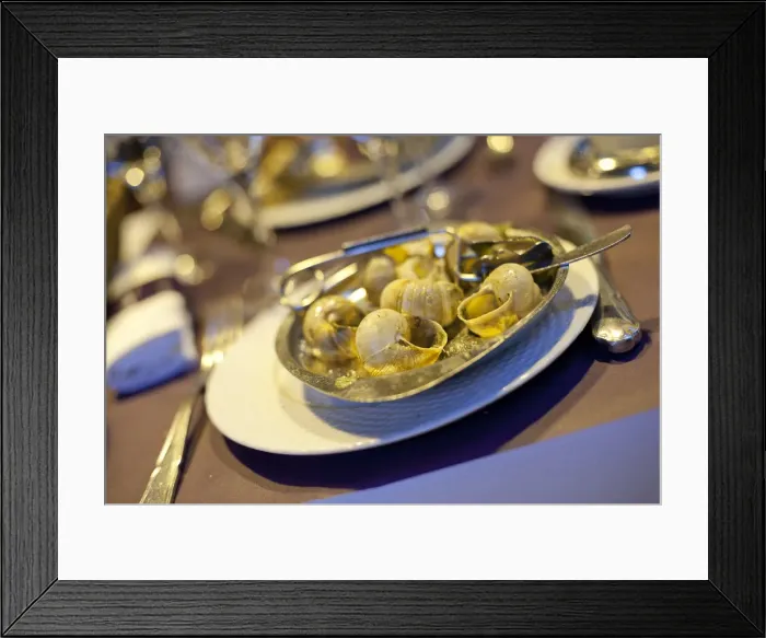 Framed Print : A dish of escargots or snails at a cafe in Paris France Framed Print : A dish of escargots or snails at a cafe in Paris France