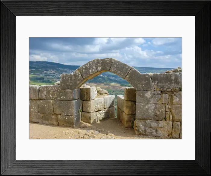Framed Print : An arrowslit at Nimrod fortress (Qal at al-Subeiba) overlooking the village of Framed Print : An arrowslit at Nimrod fortress (Qal at al-Subeiba) overlooking the village of