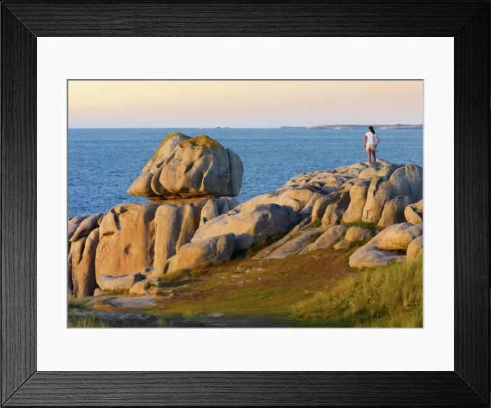 Framed Print : France, Brittany, Finistere, Cleder, woman standing on granite rocks (MR) Framed Print : France, Brittany, Finistere, Cleder, woman standing on granite rocks (MR)