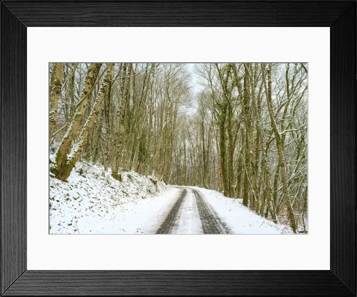 Framed Print : A small road through snow-covered forest in winter, La Creuse, Limousin, France Framed Print : A small road through snow-covered forest in winter, La Creuse, Limousin, France