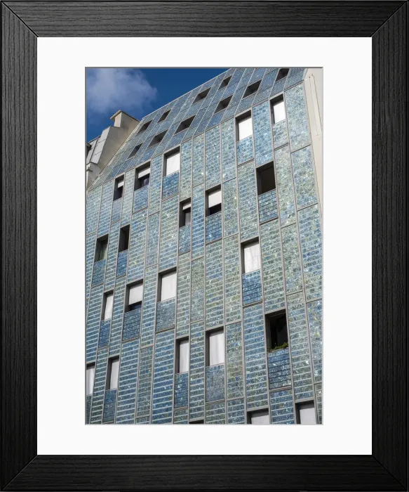 Framed Print : Facade of building covered in Photovoltaic (PV) solar panels for sustainable power Framed Print : Facade of building covered in Photovoltaic (PV) solar panels for sustainable power