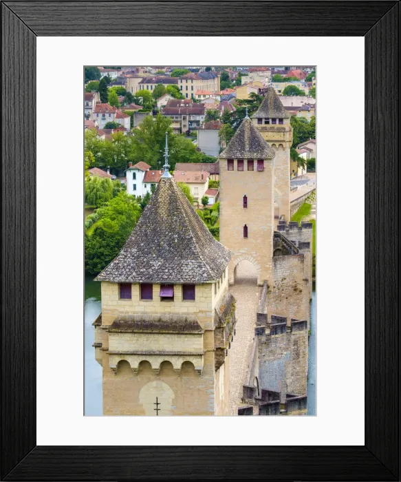Framed Print : High angle view of medieval Pont Valentra bridge over the Lot River and town of Cahors Framed Print : High angle view of medieval Pont Valentra bridge over the Lot River and town of Cahors