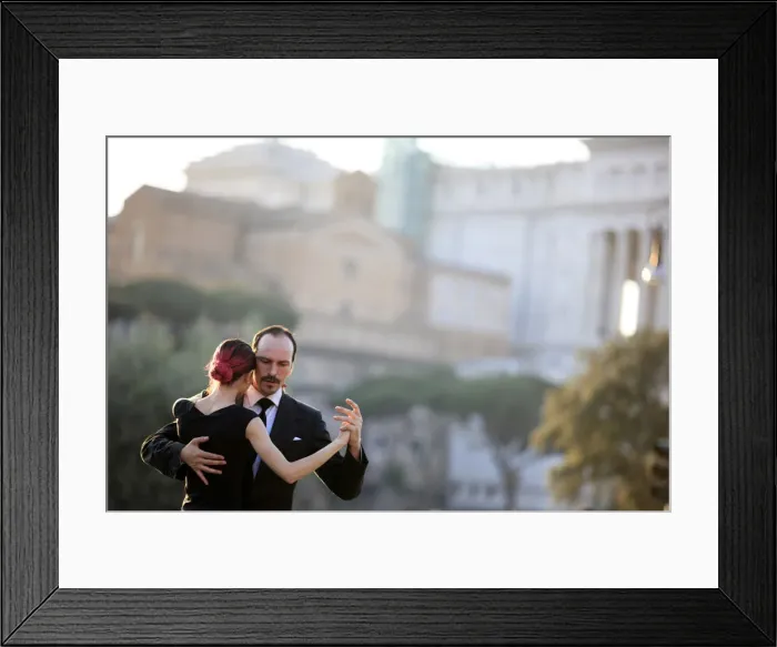 Framed Print : Italy, Rome, tango dancers at Roman Forum with Altare della Patria in the background