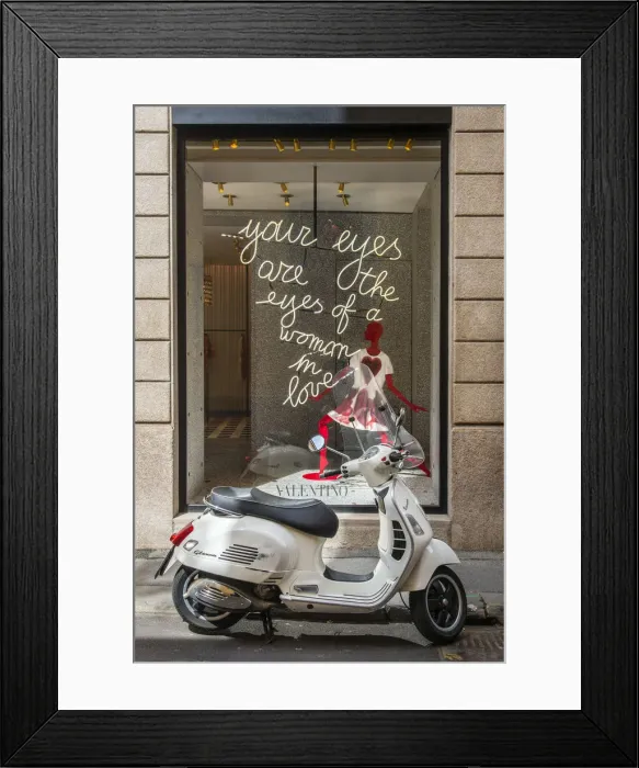 Framed Print : Italian Vespa scooter parked in Via Montenapoleone fashion street with Valentino shop Framed Print : Italian Vespa scooter parked in Via Montenapoleone fashion street with Valentino shop