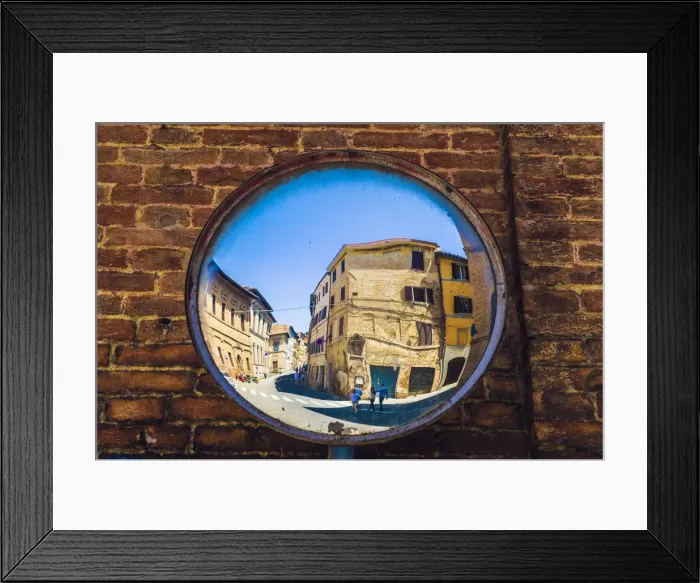 Framed Print : Siena, Tuscany, Italy. Two people reflected in a street mirror Framed Print : Siena, Tuscany, Italy. Two people reflected in a street mirror