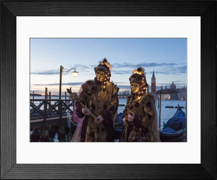 Framed Print : Couple with illuminated masks at Carnival time, Piazza San Marco (St. Marks Square) Framed Print : Couple with illuminated masks at Carnival time, Piazza San Marco (St. Marks Square)