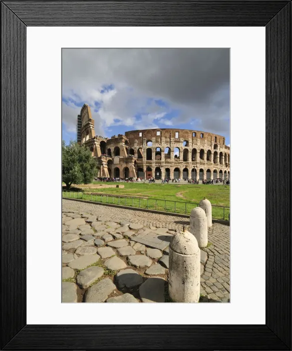Framed Print : The Colosseum or Coliseum and a roman stone pavement on the foreground Framed Print : The Colosseum or Coliseum and a roman stone pavement on the foreground