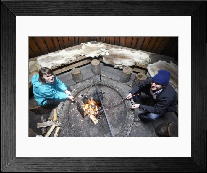 Framed Print : Europe, Finland, Lapland, Salla, tourists cooking over a wooden fire in a typical Framed Print : Europe, Finland, Lapland, Salla, tourists cooking over a wooden fire in a typical