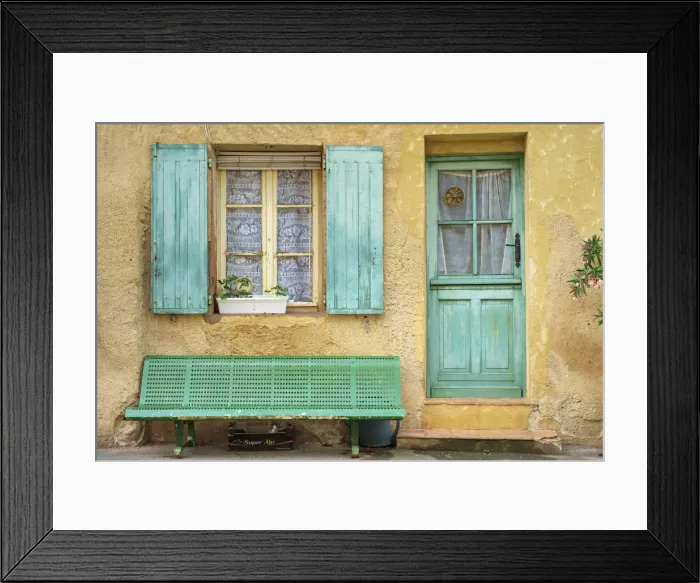 Framed Print : Cat sleeping under a bench in front of a house in Roussillon, Vaucluse Framed Print : Cat sleeping under a bench in front of a house in Roussillon, Vaucluse
