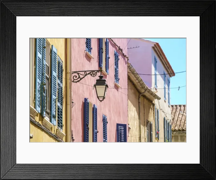 Framed Print : Colorful buildings in historic old town of Sanary-sur-Mer, Var department Framed Print : Colorful buildings in historic old town of Sanary-sur-Mer, Var department