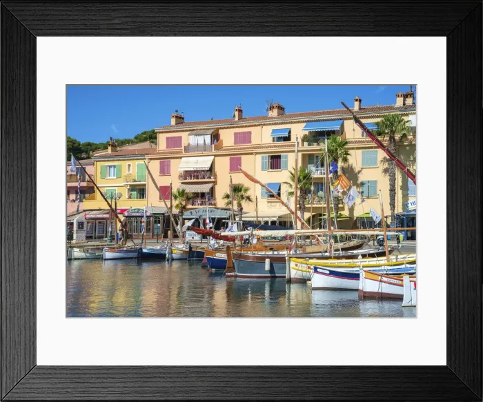 Framed Print : Port harbor filled with traditional wooden fishing boats at Sanary-sur-Mer, Var department Framed Print : Port harbor filled with traditional wooden fishing boats at Sanary-sur-Mer, Var department