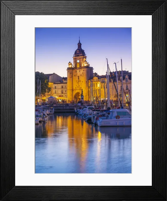 Framed Print : France, Poitou Charentes, La Rochelle, Old Harbour, Porte de La Grosse Horloge at dusk Framed Print : France, Poitou Charentes, La Rochelle, Old Harbour, Porte de La Grosse Horloge at dusk