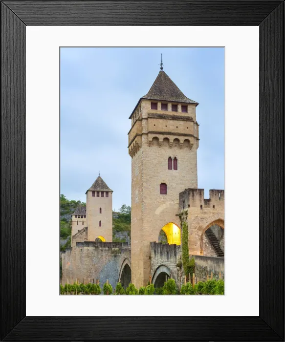 Framed Print : Medieval Pont Valentra bridge over the Lot River at dawn on cloudy morning, Cahors