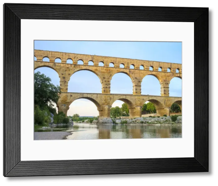 Framed Print : Pont du Gard Roman aqueduct over Gard River at sunset, Gard Department Framed Print : Pont du Gard Roman aqueduct over Gard River at sunset, Gard Department
