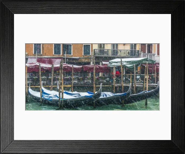 Framed Print : Venice, Veneto, Italy. Snowfall over moored gondolas along the Grand Canal (Canal Grande) Framed Print : Venice, Veneto, Italy. Snowfall over moored gondolas along the Grand Canal (Canal Grande)