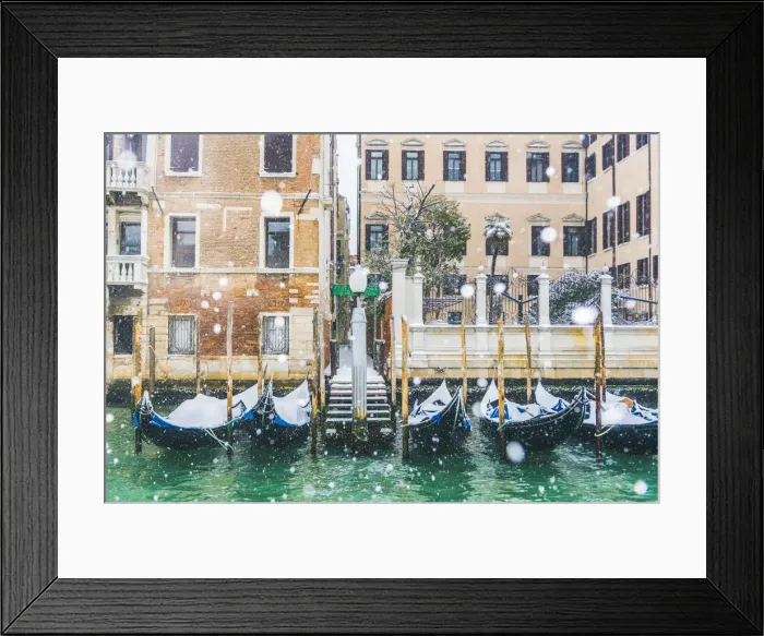 Framed Print : Venice, Veneto, Italy. Snowfall over moored gondolas along the Grand Canal (Canal Grande) Framed Print : Venice, Veneto, Italy. Snowfall over moored gondolas along the Grand Canal (Canal Grande)