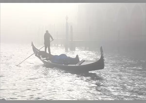 Gondola across the Grand Canal due to fog, Venice, Veneto, Italy