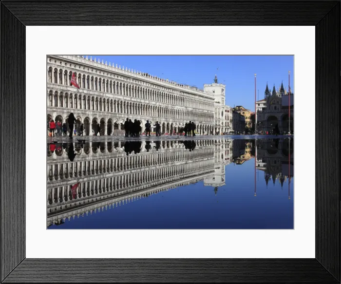 Framed Print : Procuratie Vecchie and Clocktower are Reflected in the High Water (Acqua alta) of St Framed Print : Procuratie Vecchie and Clocktower are Reflected in the High Water (Acqua alta) of St