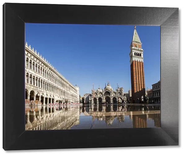 Procuratie Vecchie, the Basilica San Marco and the Campanille reflected in the high Water