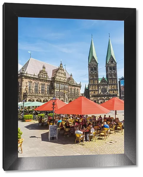 Bremen, Bremen State, Germany. People eating out in Marktplatz in front of the Town Hall