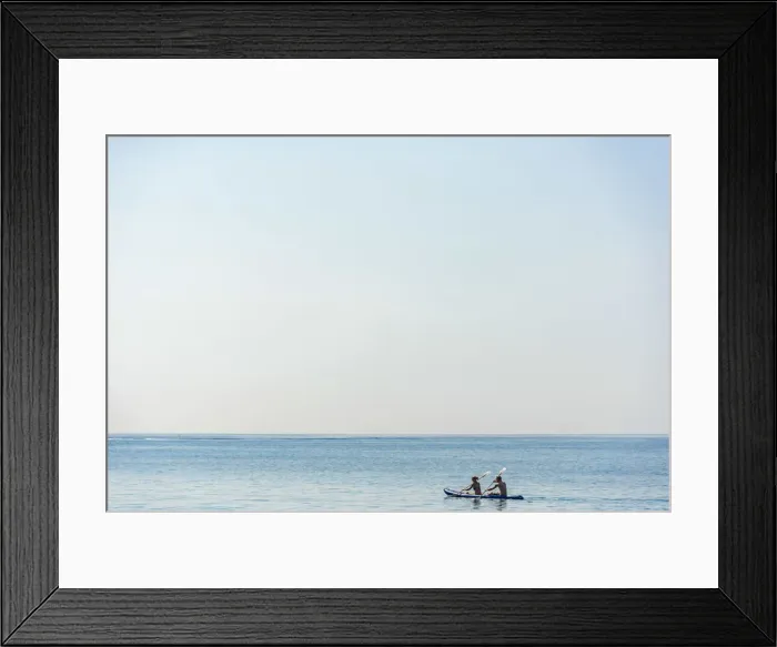 Framed Print : Europe, Italy, Liguria. Paddling a canoe in Monterosso, Cinque Terre