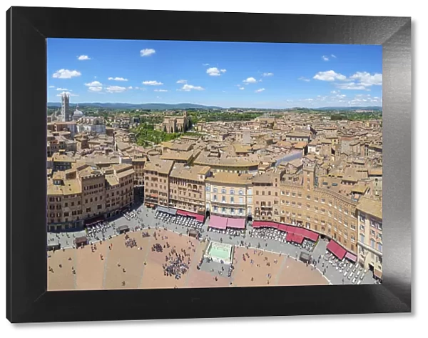 Piazza del Campo and buildings in old town, high angle view. UNESCO World Heritage Site