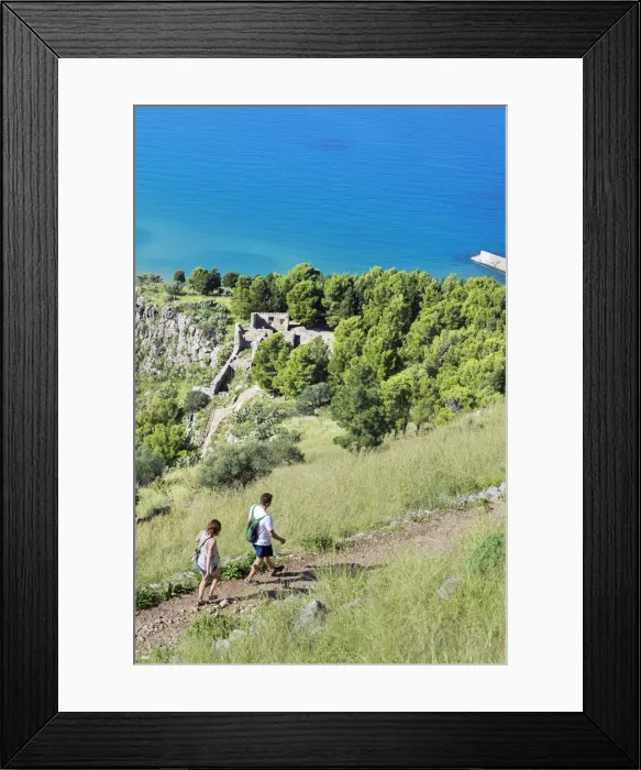 Framed Print : People walking at cliff La Rocca, Cefalu, Sicily, Italy, Europe Framed Print : People walking at cliff La Rocca, Cefalu, Sicily, Italy, Europe