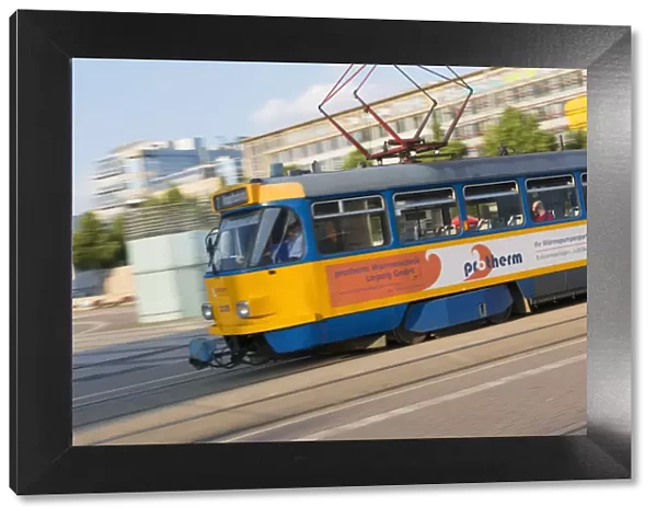 Tram passing through Augustusplatz, Leipzig, Saxony, Germany