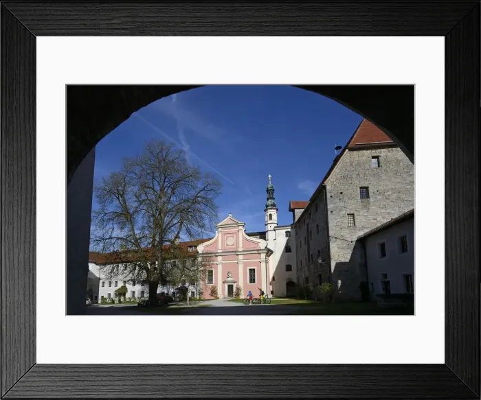 Framed Print : Electric cyclists before the church of St. Michael in the castle Tittmoning, Chiemgau Framed Print : Electric cyclists before the church of St. Michael in the castle Tittmoning, Chiemgau