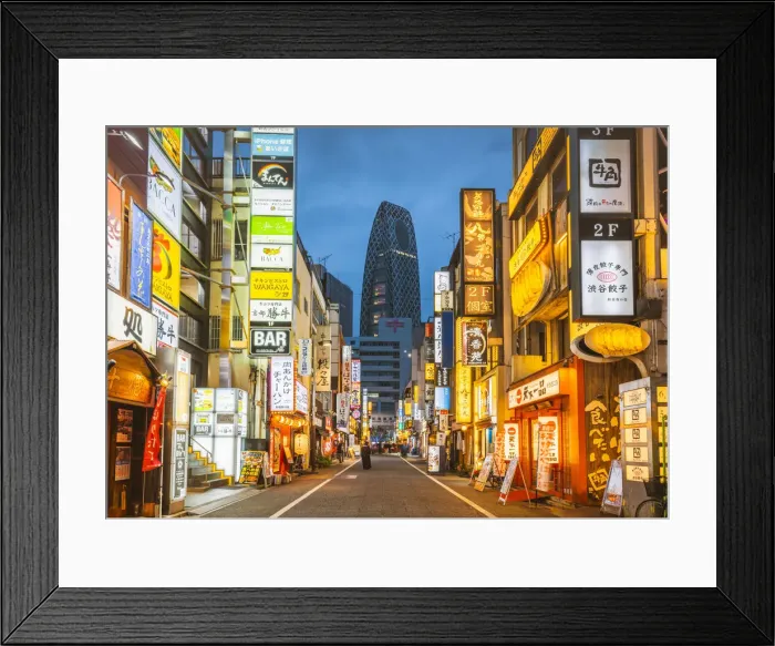 Framed Print : Shinjuku, Tokyo, Kanto region, Japan. Illuminated neon signs at dusk and Cocoon Tower
