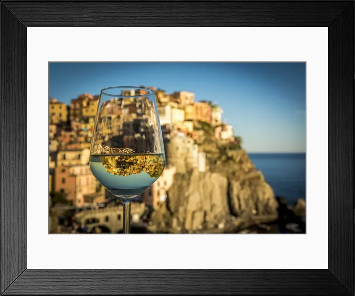Framed Print : europe, Italy, cinque Terre. view of the village of Manarola with a reflection in