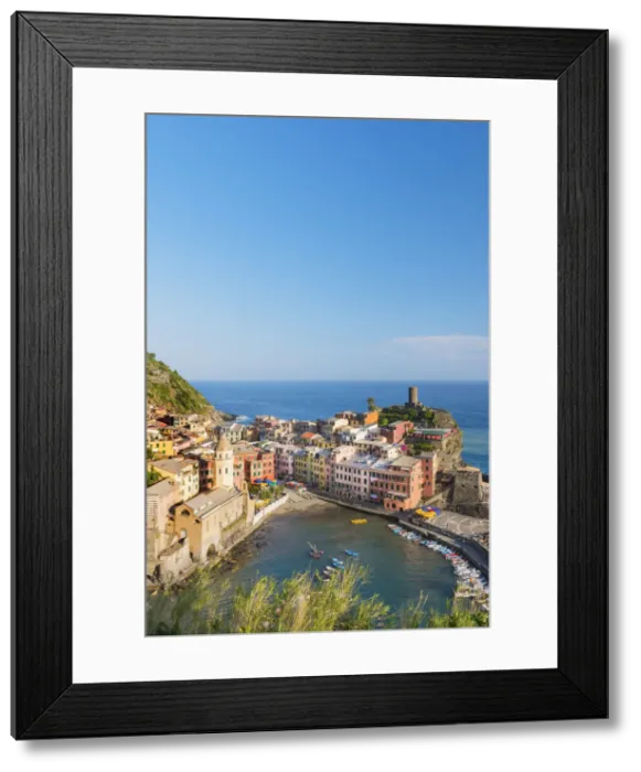 Framed Print : View overt the rooftops and port of Vernazza from above Santa Margherita di Antiochia Framed Print : View overt the rooftops and port of Vernazza from above Santa Margherita di Antiochia