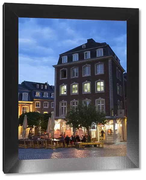 Outdoor cafes in square, Aachen, North Rhine Westphalia, Germany