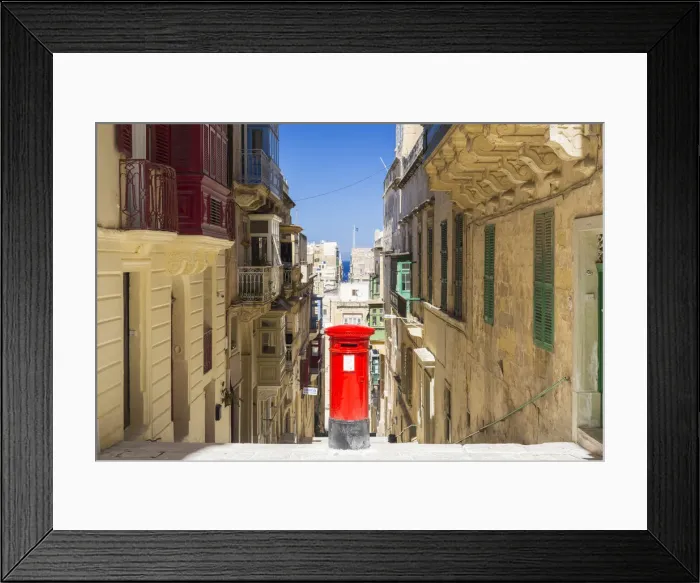 Framed Print : Malta, South Eastern Region, Valletta. An old British style post box in a traditional Framed Print : Malta, South Eastern Region, Valletta. An old British style post box in a traditional